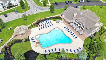 Heated pool with cascading waterfall and gazebo